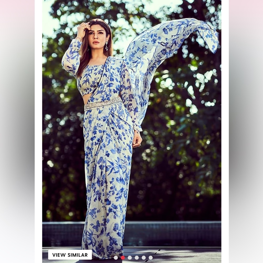 Paulmi and Harsh Floral Blue and White Saree